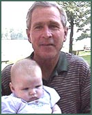 President George W Bush with adoptive baby