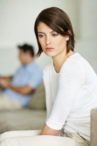 woman feeling distanced from her partner