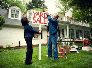 putting up a yard sale sign