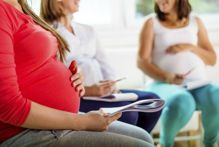 pregnant women support each other
