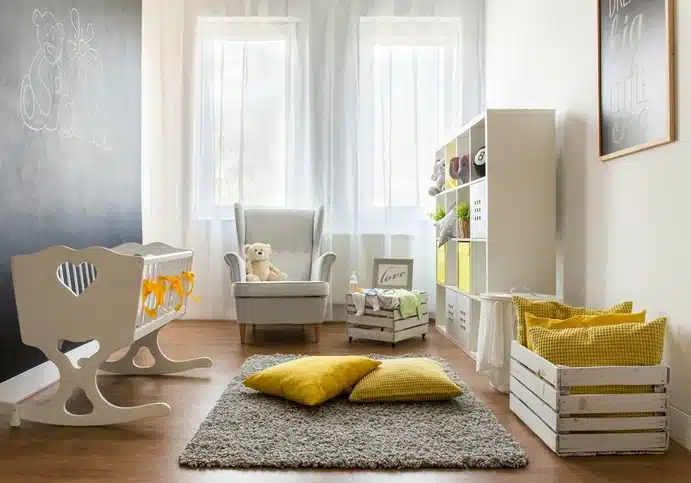 Empty nursery decorated in yellow and gray