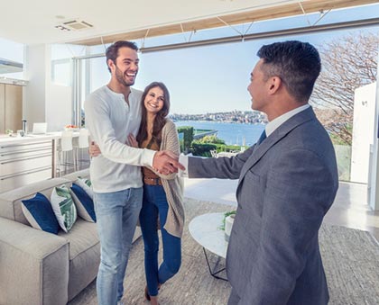 Couple meeting with their home study provider, Lifetime Adoption's paperwork can be handled country wide