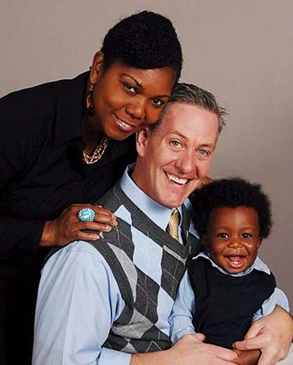 Smiling family brought together through Lifetime adoption