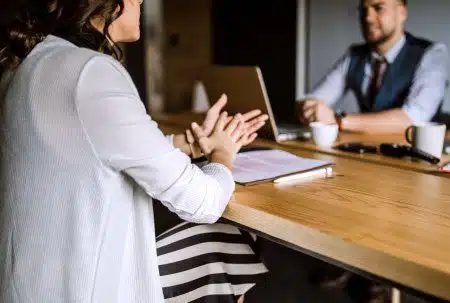 woman talks to HR personnel