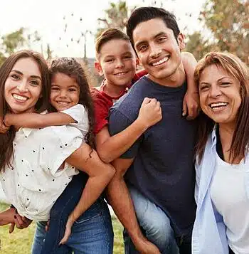 Adoptive mother with birth family in an open adoption agreement