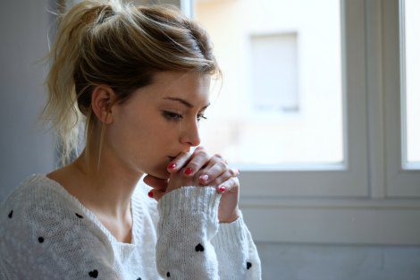 Young mom thinking hard about after-delivery adoption