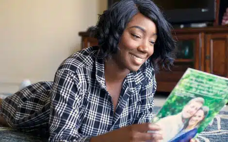A birth mom looks through an adoption profile