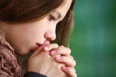 worried pregnant woman thinking