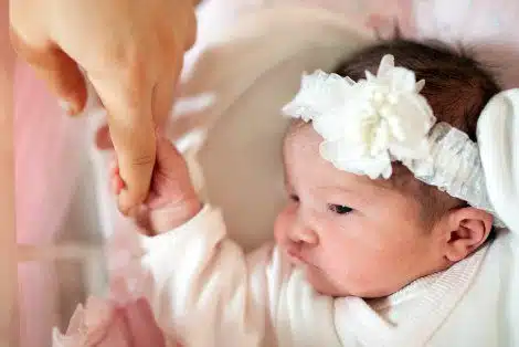 Newborn baby girl at her adoption entrustment ceremony