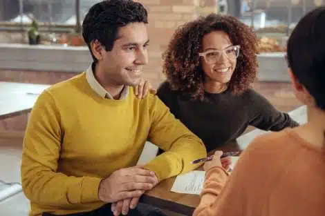 Adoptive couple meeting with a social worker for their home study