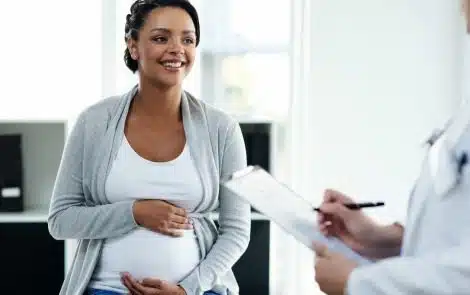 pregnant woman discussing her hospital plan