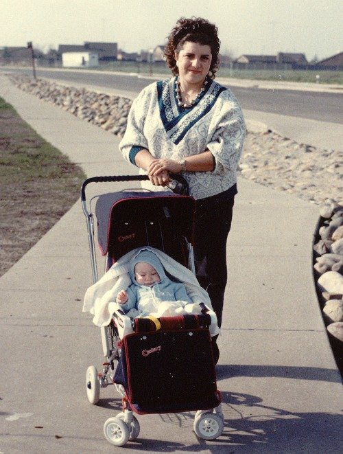 The author, Mardie Caldwell, taking her adopted son for a stroll back in the 80's