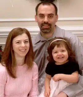 Arianna with her parents Tisha and Tim