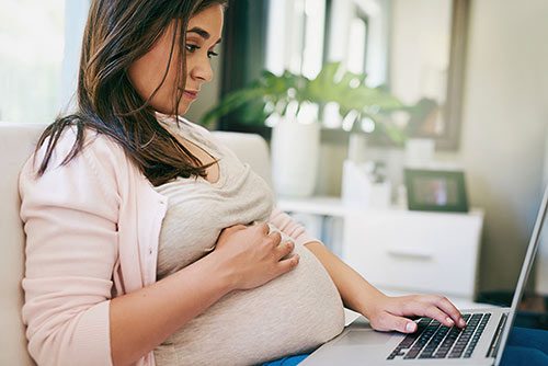 Pregnant woman browses profiles because she's looking for parents to adopt my baby