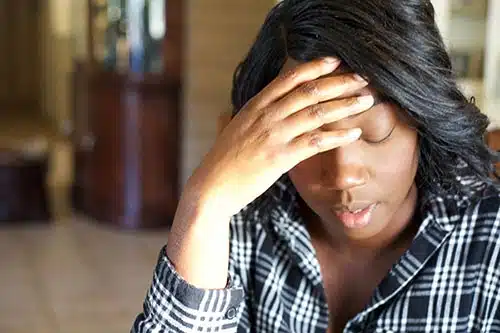 Woman experiencing after adoption birth mother trauma
