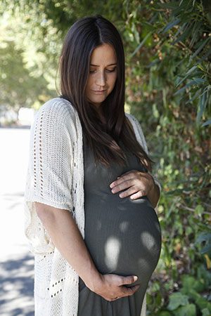 pregnant woman going through the adoption process