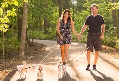 Scott and Gene taking their dogs for a walk