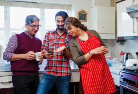 Hopeful adoptive dad showing his parents adoption webinars