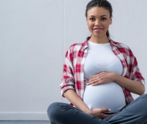 pregnant woman in flannel