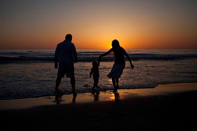 adoptive family at Florida beach