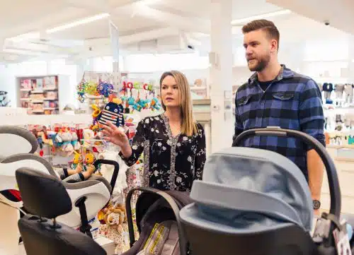 Adoptive parents-to-be visit a store to start their adoption registry