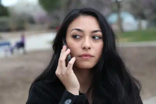Young woman talking to a professional after considering adoption
