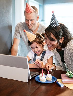 Adoptive parents and their daughter have a virtual celebration with birth parent