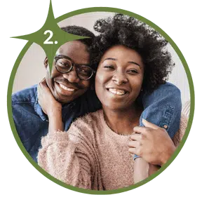couple smiling at camera how to start the adoption process 2