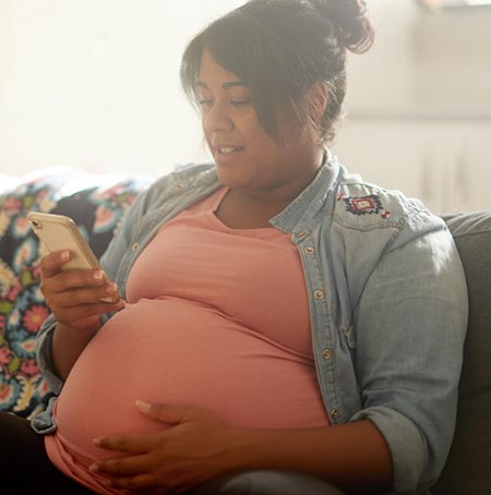 pregnant woman reading poems about adoption