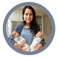 headshot of Valerie Trumbower holding twin babies