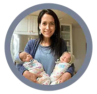headshot of Valerie Trumbower holding twin babies