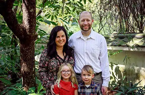 Adoptive couple Rachel and Josh with their children