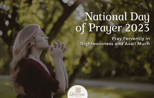 Photo of woman praying outside with the words "National Day of Prayer" seen