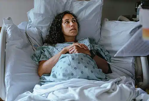 pregnant woman asking doctor if it's too late for adoption