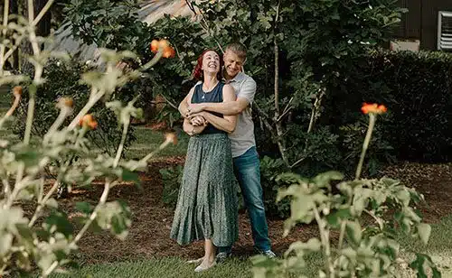 Hopeful adoptive parents Kelly and Dan embrace