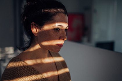 Young woman in her apartment post adoption