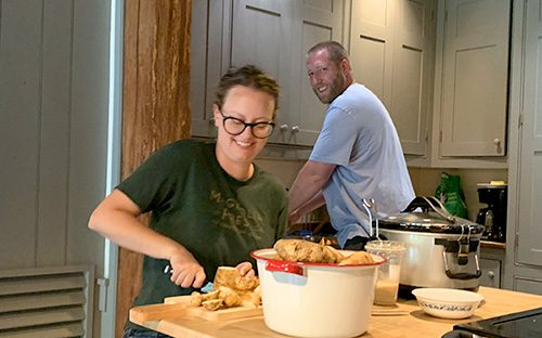 Hopeful adoptive parents Al and Laura preparing food together