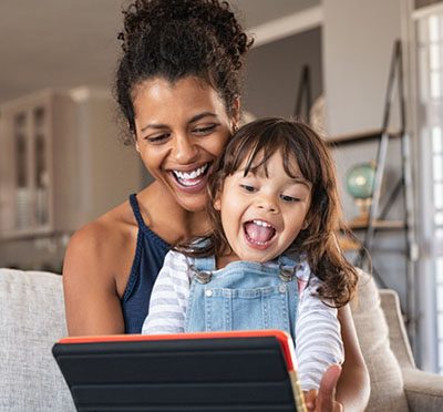 adoptive mom and daughter on device contacting birth mom