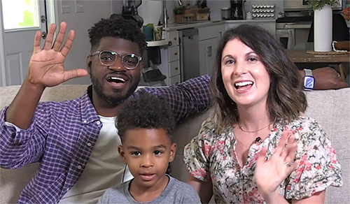 Hopeful adoptive parents James and Lauren wave hello with their son