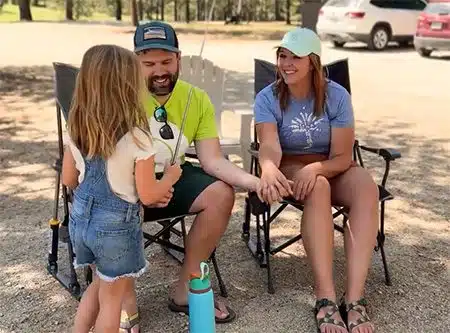 Jared and Andrea camping with their daughter