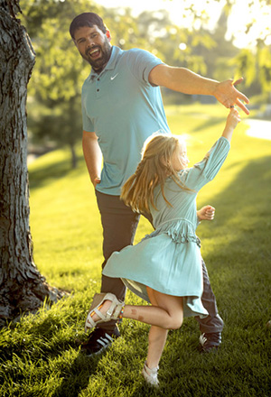 South Dakota dad Jared dancing with his daughter