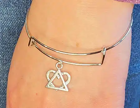 Adoption Symbol Bracelet on wrist