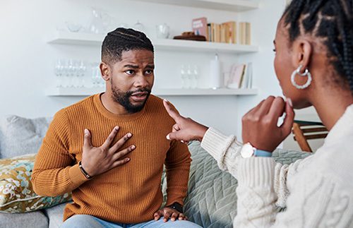 Young couple having an argument at home