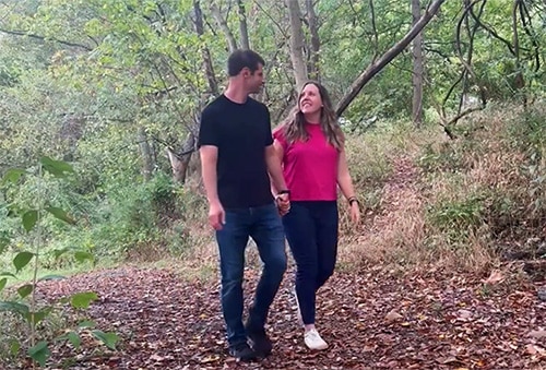 Bob and Emily hiking together
