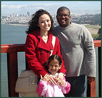 Kim with her husband and daughter