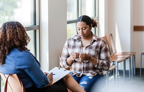 Birth mother receiving post adoption support through grief counseling