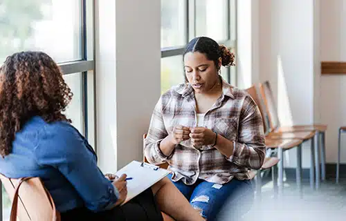 A birth mother receives post adoption support in the form of grief counseling
