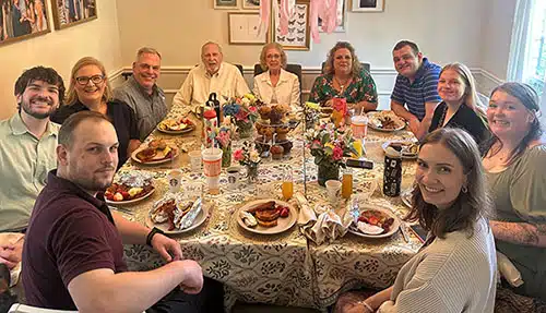 Michael and Beverly's big, loving extended family seated for a dinner together